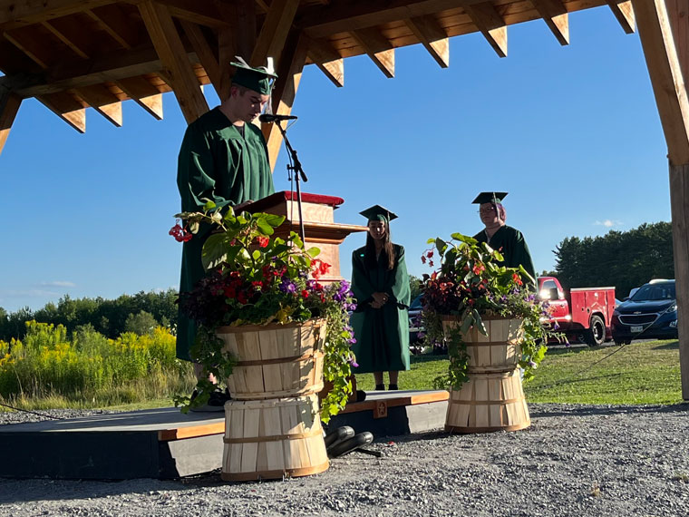 A student speaking at the 2022 MeANS graduation ceremony